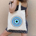 White canvas tote bag featuring a blue Greek Evil Eye mandala print on the front - STD1804-L Exotic Framed Eye