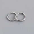 Close-up of minimalist silver hoop earrings featuring S925 hallmark on the inner band - 10mm Inner Diameter (Platinum Color)