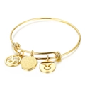 Adjustable golden stainless steel Taurus zodiac bangle with engraved charm and cut-out symbols - Gold Taurus (KB88093-Z)