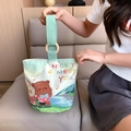 Canvas bucket handbag with mint green handle and cartoon animal print in cream white - Musical Bear