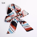 Long silk scarf with S14 abstract geometric print tied in a bow on a white background - S14-Abstract Geometric Color Block