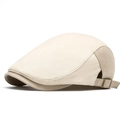 Vista laterale del berretto newsboy beige con fibbia in bronzo vintage regolabile - Beige