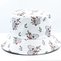 Detail of white reversible bucket hat featuring cute cartoon koala and green leaf prints - 16# White Koala Leaves Print