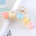 Close-up of macaron heart hair claw clip with colorful 3D hearts on white background - Colorful Hearts