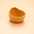 Mustard yellow silicone suction bowl for babies designed for self-feeding training - Snail Bowl / Ginger Yellow