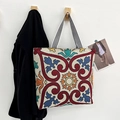 Embroidered canvas tote bag with vintage floral patterns and striped handle straps - Style 1