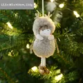 Beige plush Christmas reindeer girl ornament with gold antlers on a holiday tree - Brown Antler Girl
