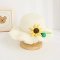 Detail of kids straw sun hat featuring elegant lace trim and a yellow fabric sunflower - Hat / Cream
