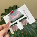 Close-up of cute acrylic hippo and apple hair clip set on a fashion jewelry card - Apple Hippo Clip 3PCS Set