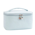 Quilted light blue makeup bag with top handle and dual zipper closure for travel - Blue