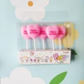 Five pink heart-shaped birthday candles with white stems in a transparent blister pack - Pink Heart Birthday Candle