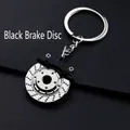 Creative automotive keychain featuring a black brake disc and silver caliper design - Black Brake Disc