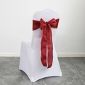 White stretch chair cover with a large deep red satin bow for wedding banquet chairs - Burgundy