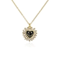 Detail van hartvormige ketting met zwart emaille smiley en fonkelende zirkoon omlijsting - Zwart