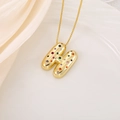 Detail view of gold bubble letter H pendant inlaid with colorful zirconia stones - Letter H