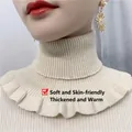 Detail of cream knit faux collar featuring ribbed high neck and ruffled hem texture - Beige (Enlarged and Thickened Version)