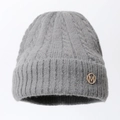 Close-up of grey mohair knit beanie featuring a fuzzy texture and gold rhinestone M logo - One Size / Grey (Round M)