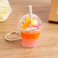 Cute orange and pink bear ice cream drink keychain with star charm and metal ring - Orange