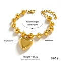 Polished gold stainless steel bead bracelet featuring a large hanging heart pendant - Gold Heart Bead Bracelet (B658)