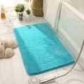 Plush turquoise microfiber rectangular bath mat in a modern marble bathroom setting - Turquoise Blue