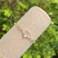 Bracciale ali di cuore placcato oro 18K con perla e maglia infinito in esposizione - Ali di Cuore Perla