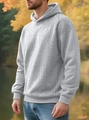 Détail d'un sweat à capuche gris clair pour homme avec maille jacquard texturée et bords-côtes - S / Gris clair