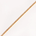 Close-up of a gold-plated tennis bracelet featuring claw-set amber cubic zirconia stones - Champagne - Gold