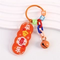 Cute acrylic keychain with orange lucky charms, bell, and colorful beads for bags - Peace and Joy (Orange)