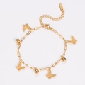 Vista de detalle de los colgantes de mariposa dorados y bolas pulidas en pulsera de acero - Dorado