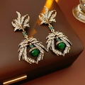 Detail shot of vintage golden leaf earrings with green beads and rhinestones - Vintage Leaf Shape Earrings (WE3405) / Bronze with Green Gemstone