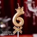 Golden number 6 birthday candle with crown detail and glittery bow tie decoration - Number Candles Crown Bow Champagne Color 6