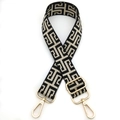 Detail of black and white geometric pattern bag strap with gold metal swivel hooks - Gold Buckle / Black Beige