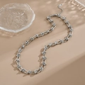 Collana a catena unisex in acciaio al titanio argento con design a maglie a U - Collana / Argento