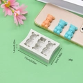 Three-hole bear silicone mold showing dimensions 7.5cm x 5cm x 1.4cm for DIY crafts - Triple Bow Bear Style (5)