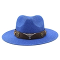 Close-up of bright blue straw cowboy hat with brown leather band and silver bull head detail - Sapphire Blue