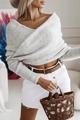 Dettaglio ravvicinato del maglione in maglia grigia con scollo a V e trama a coste - Taglia S / Grigio
