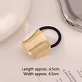 Golden wavy metal plate hair tie with high-elastic black band for elegant styling - Kc Golden Arch Clouds