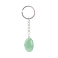 Macro detail of oval green natural agate stone keychain with silver metal chain on white - Green Aventurine