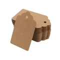 Macro shot of wavy edge kraft paper gift tags with pre-punched holes in brown finish - 100Pcs/Pack / Kraft Color