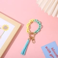 Fashion acrylic keychain with yellow and green resin links and a blue silk tassel detail - Yellow + Lake Blue