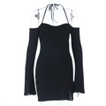 Detail view of black knit dress featuring halter neckline and side slit hem design - XS / Black
