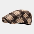 Dettaglio della coppola vintage in lana a quadri marroni con trama classica in evidenza - Taglia unica / Plaid Marrone Cachi