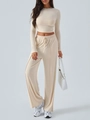 Set in maglia Y2K beige da donna con crop top a maniche lunghe e pantaloni larghi - S / Albicocca