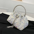 Chic iridescent white sequin bucket bag with silver ring handle and tassel details - White