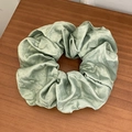 Pale green satin scrunchie with metallic luster and pleated texture on wood table - Large / Grey Green