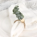 Detail of eucalyptus leaf napkin ring with natural wood bead and rustic twine wrap - With Wire Leaf Style