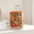Close-up of brown kraft Christmas gift bag featuring Santa and Happy Holidays print - Kraft Paper / 023-3 Santa Driving Sleigh (21x15x8)