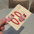 Pair of red snap hair clips with pink glittery cupcake decor on a cream card - Heart Cake (Pair)