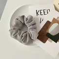 Elegant grey ribbed knit scrunchie hair tie on white aesthetic display tray - Stripe Grey