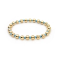 Detail of 18K gold and turquoise beaded stretch bracelet with high-polish metallic finish - Gold + Sky Blue